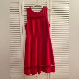 Red Miami above the knee length, cocktail dress! Red with mesh detailing.